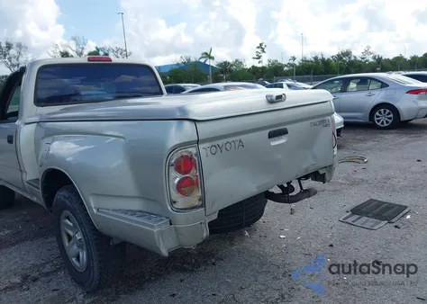 2001 Toyota Tacoma из США, поврежденный, VIN 5TENL42N01Z792746